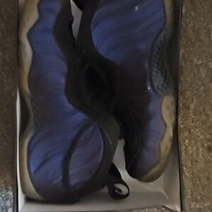 Used varsity purple Foamposite One.